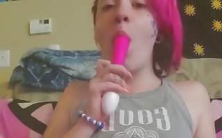 Minor girl with pink hair fucking beaver with a vibrator